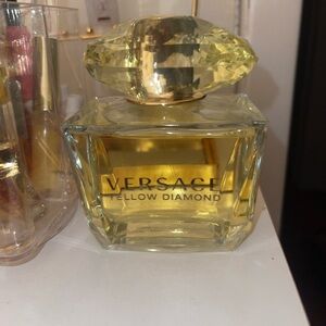 Used  (sprayed 2 or 3 times) 6.7 bottle of Versace Yellow Diamond.